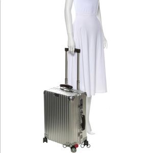 Rimowa check in suitcase